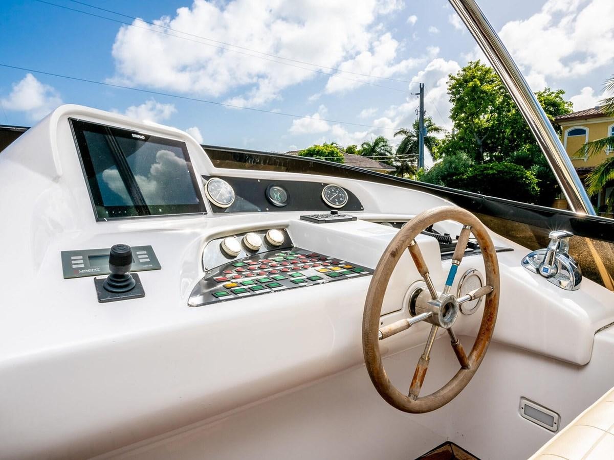 the inside of a car aboard NUEVA OLA Yacht for Sale