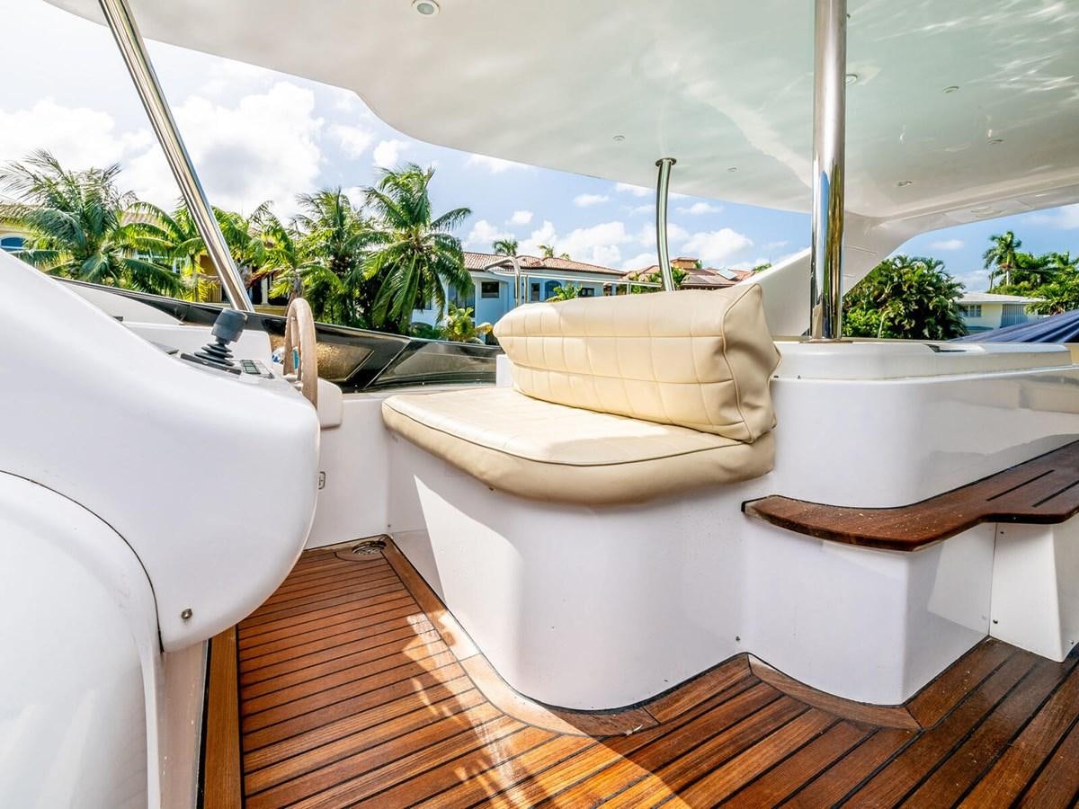 a bathroom with a large window aboard NUEVA OLA Yacht for Sale