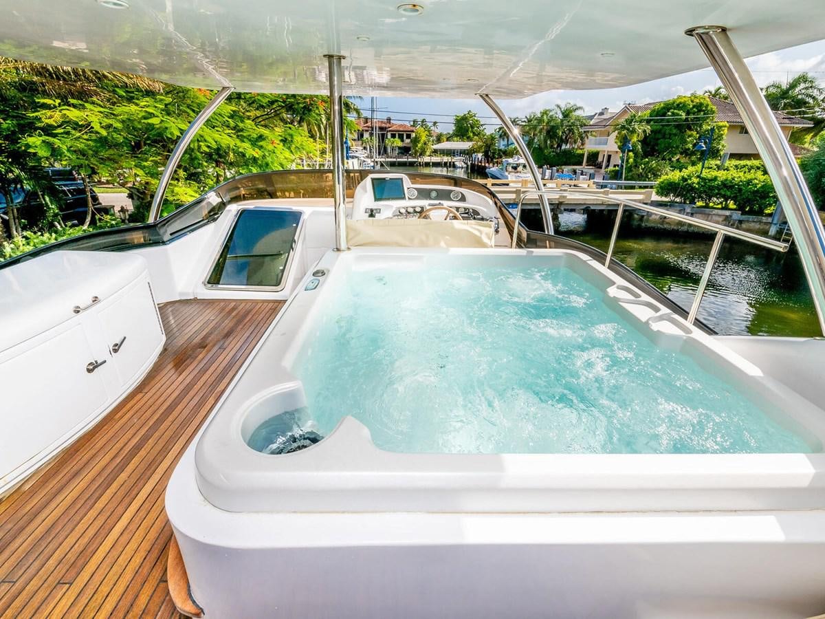 a swimming pool on a deck aboard NUEVA OLA Yacht for Sale