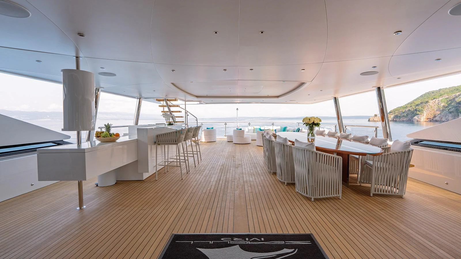 a room with tables and chairs aboard SEAGULL MRD Yacht for Sale