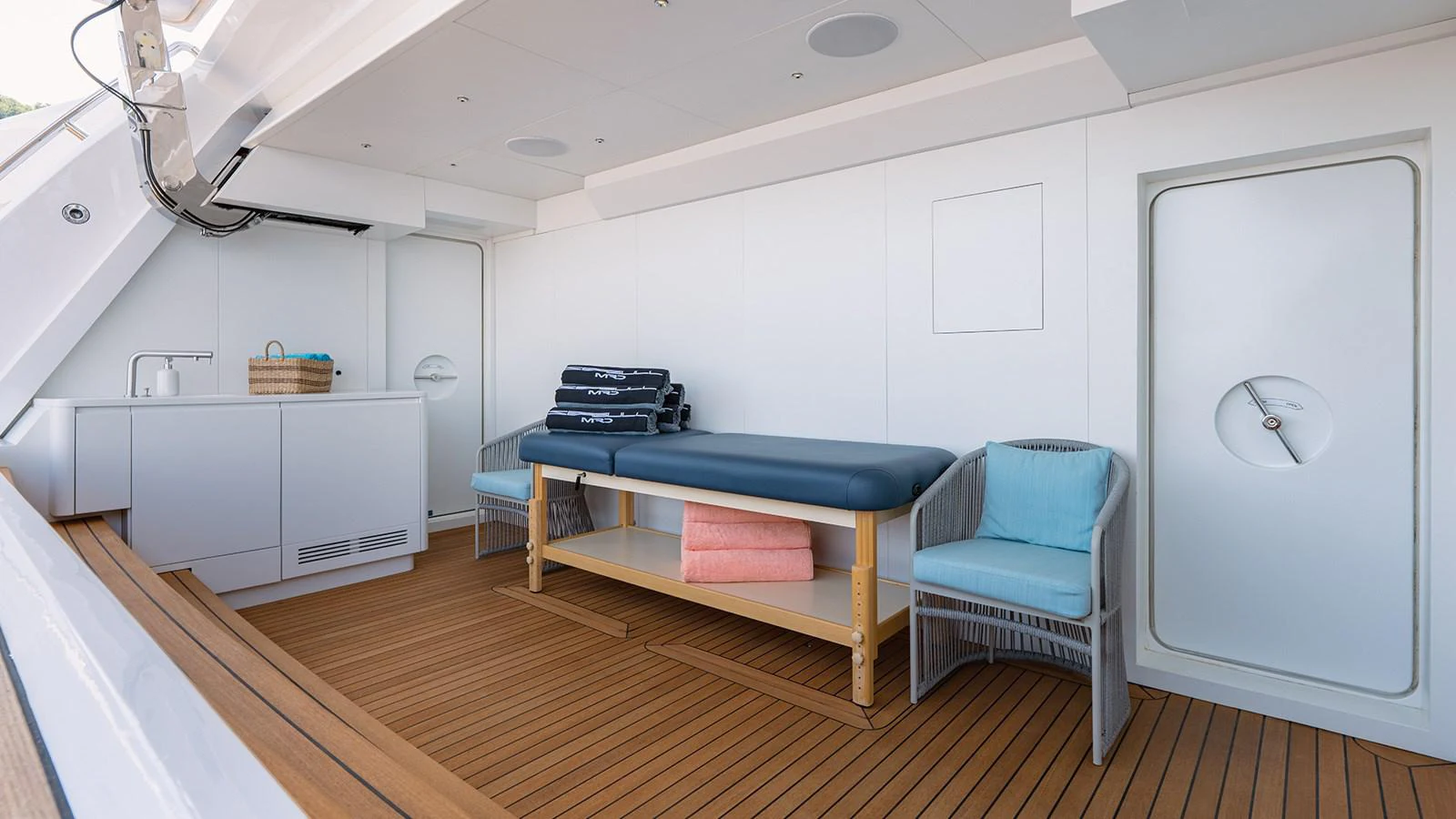 a room with a table and chairs aboard SEAGULL MRD Yacht for Sale