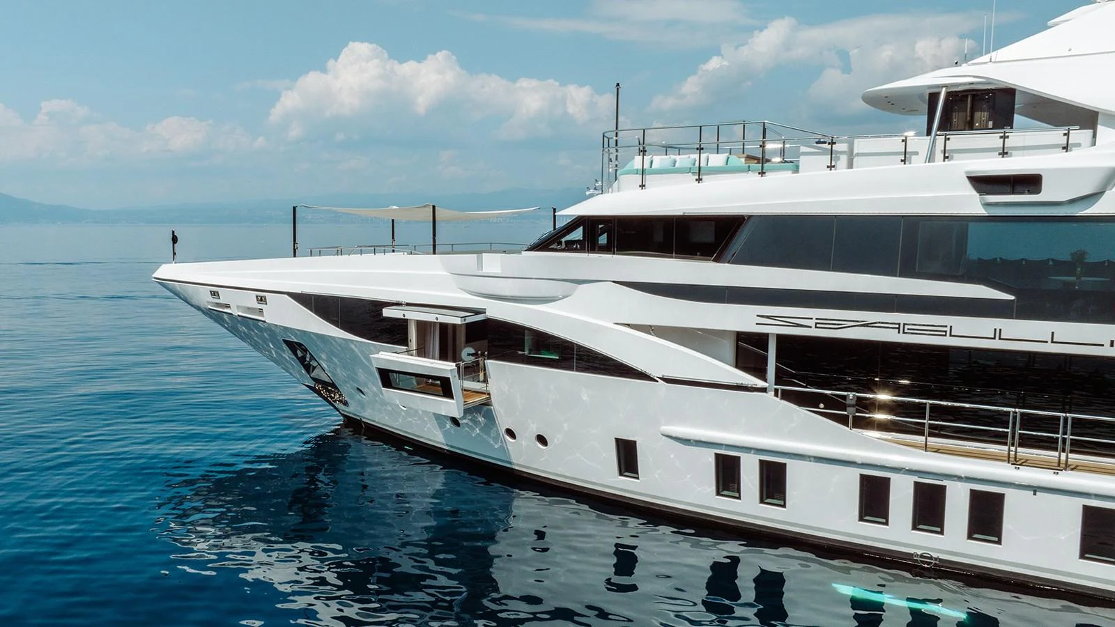 a white yacht in the water aboard SEAGULL MRD Yacht for Sale