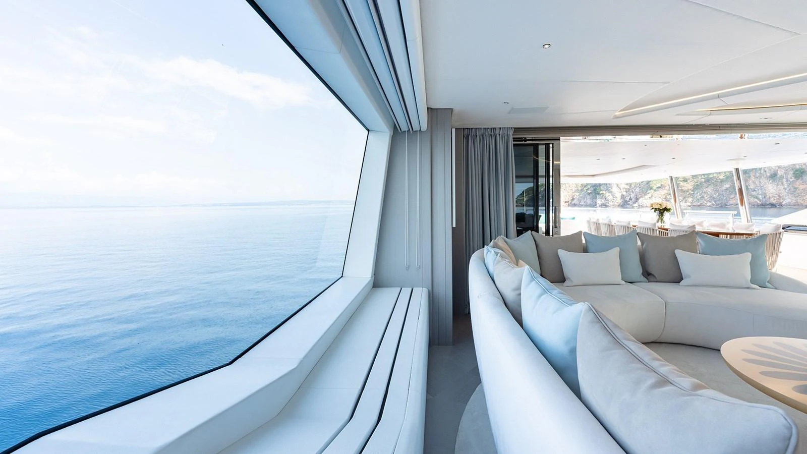 a living room with a large window aboard SEAGULL MRD Yacht for Sale