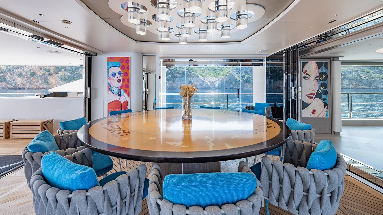 a large living room with a large table and chairs aboard SEAGULL MRD Yacht for Sale