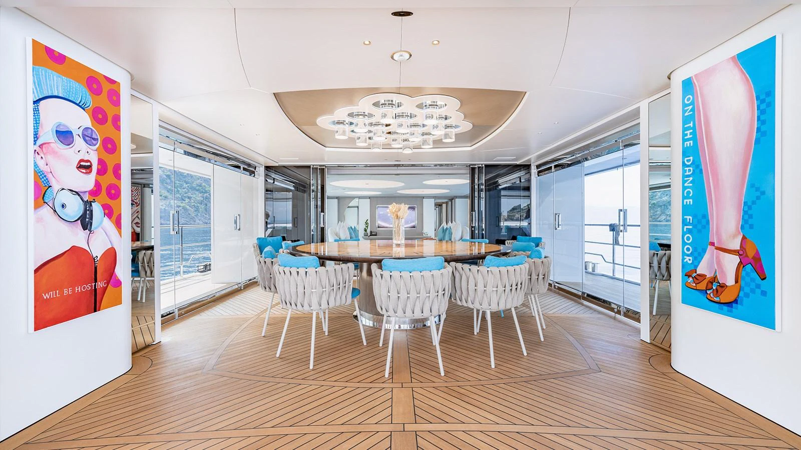 a room with tables and chairs aboard SEAGULL MRD Yacht for Sale