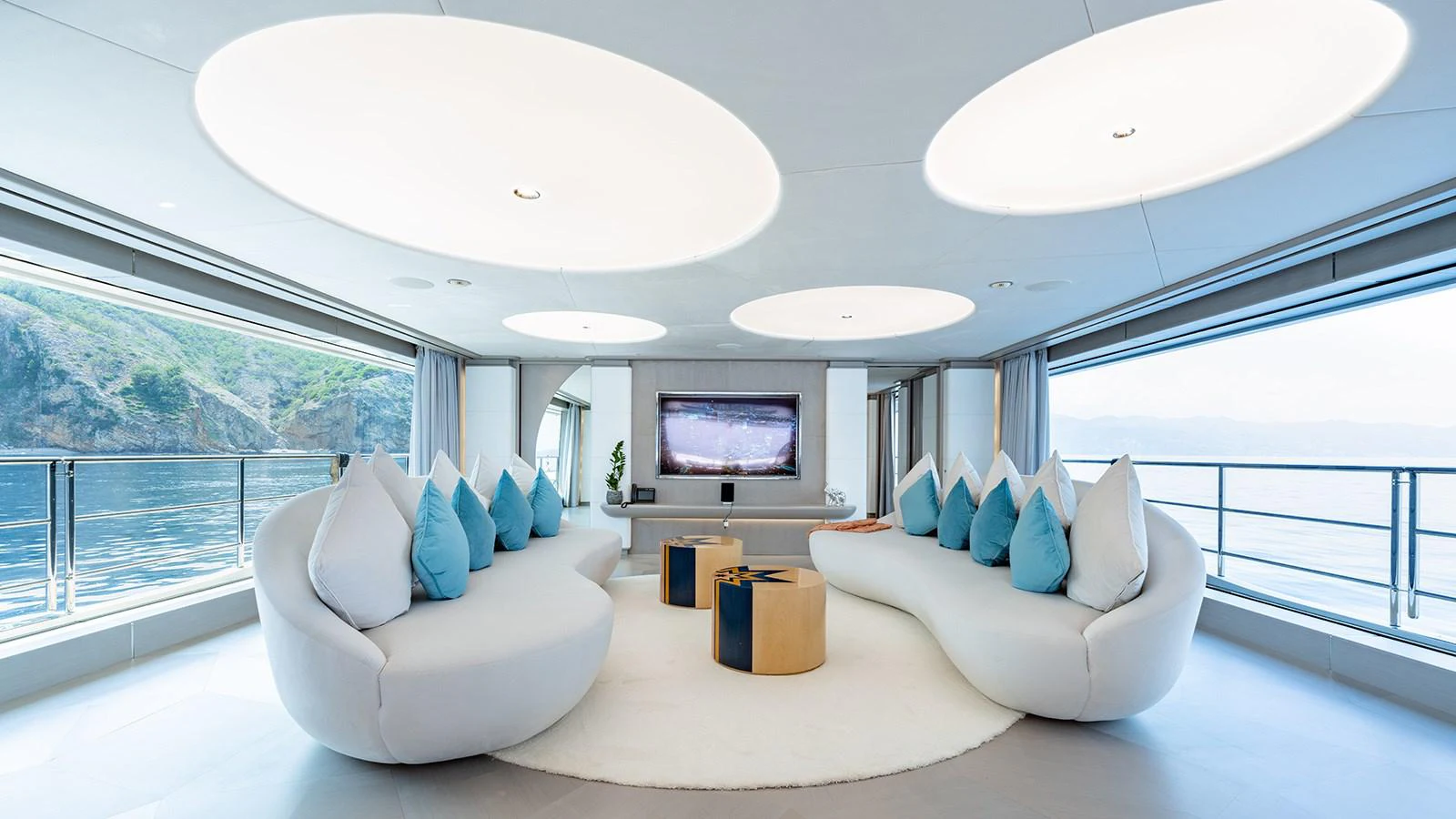 a room with a large window and a large white bed and a large window with a view of aboard SEAGULL MRD Yacht for Sale