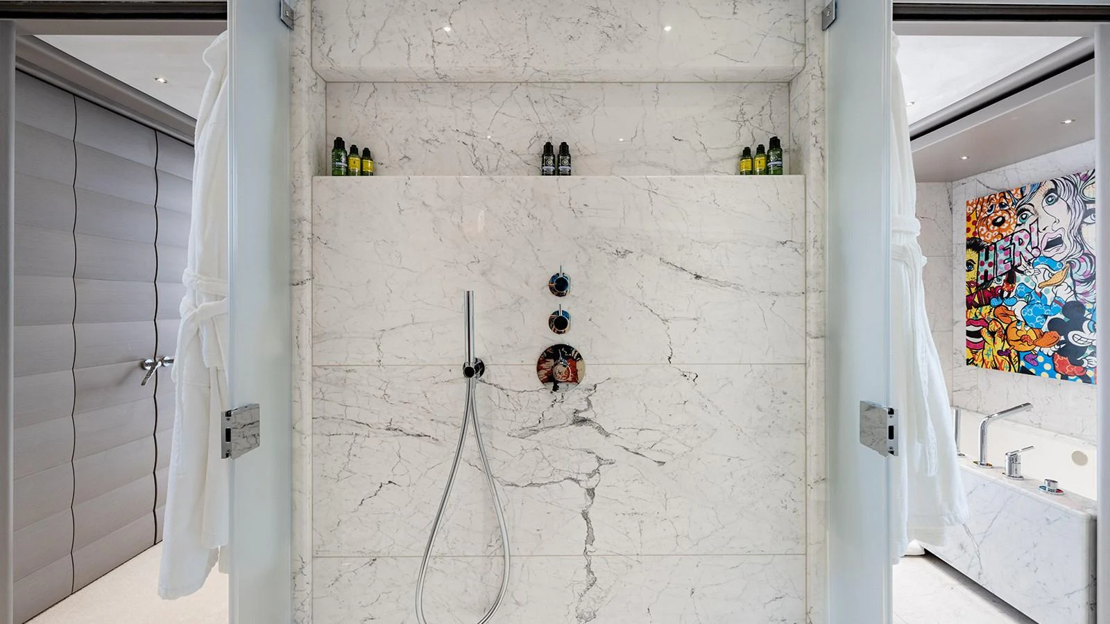 a shower with a painting on the wall aboard SEAGULL MRD Yacht for Sale
