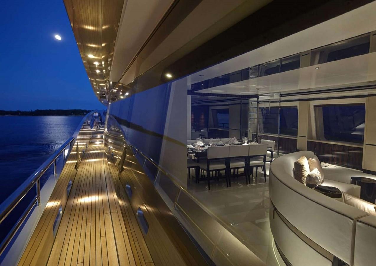 a deck with a view of the ocean and the deck aboard EXCELLENCE V Yacht for Sale