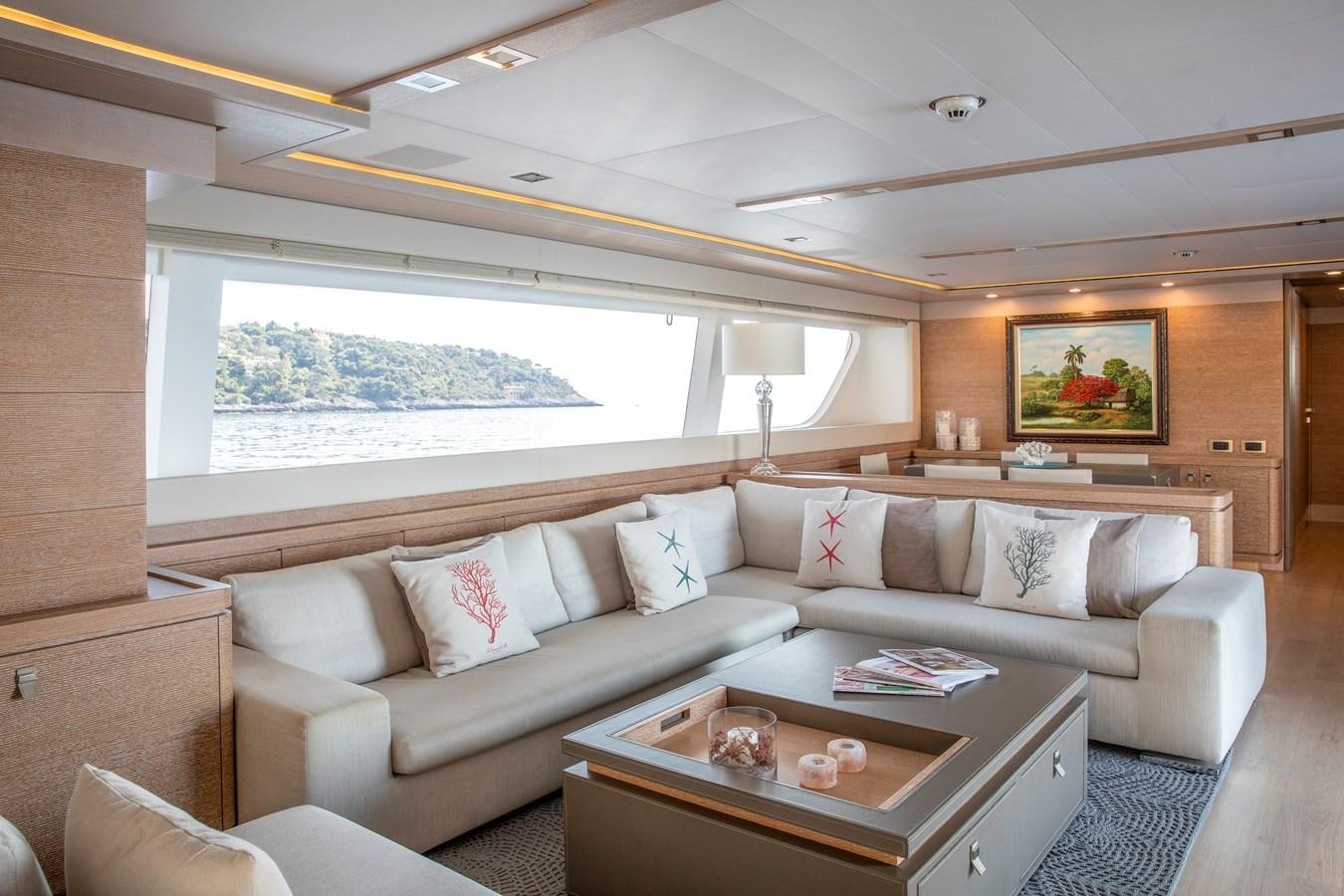 a living room with a large window aboard CENTURION Yacht for Sale