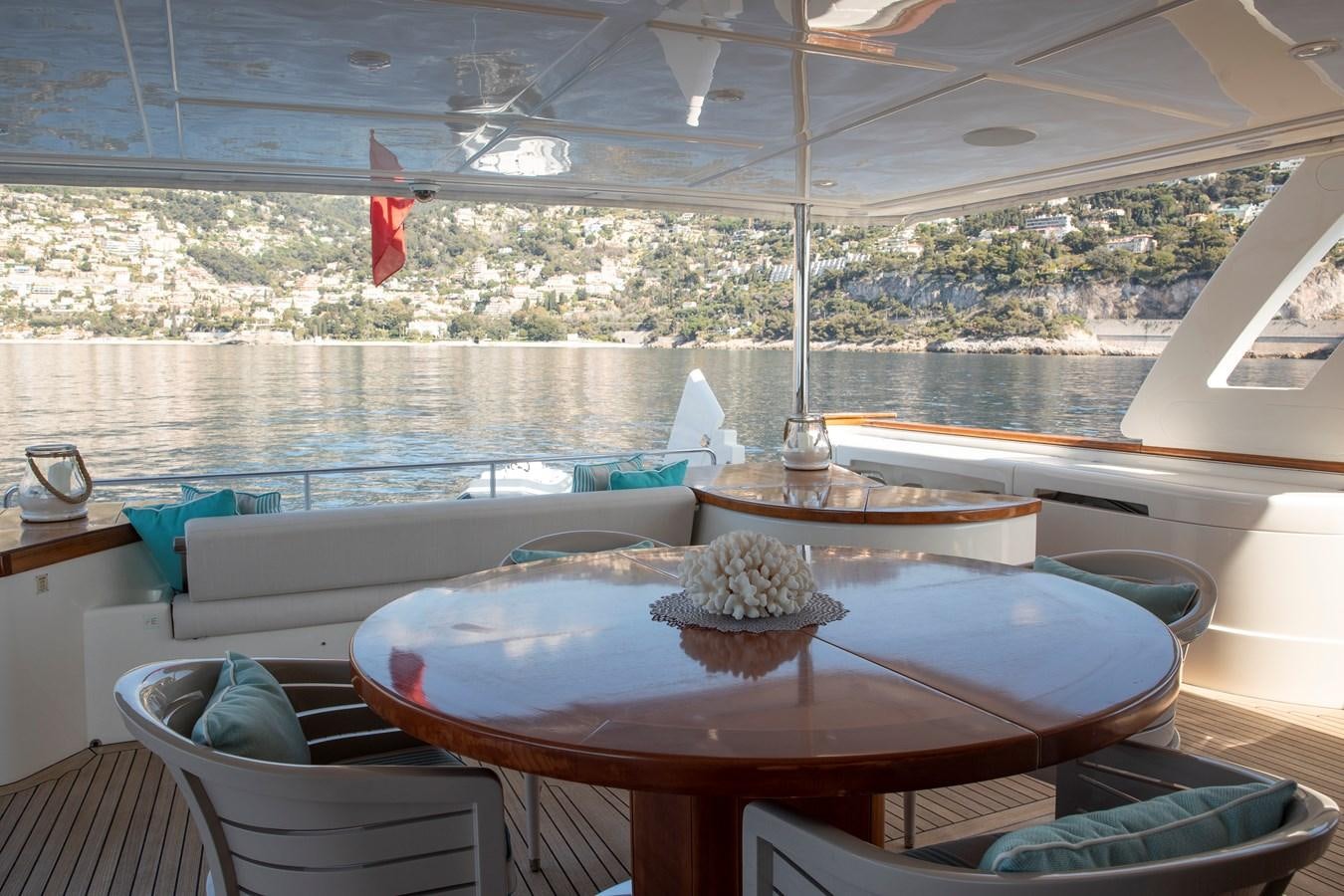 a room with a table and chairs aboard CENTURION Yacht for Sale