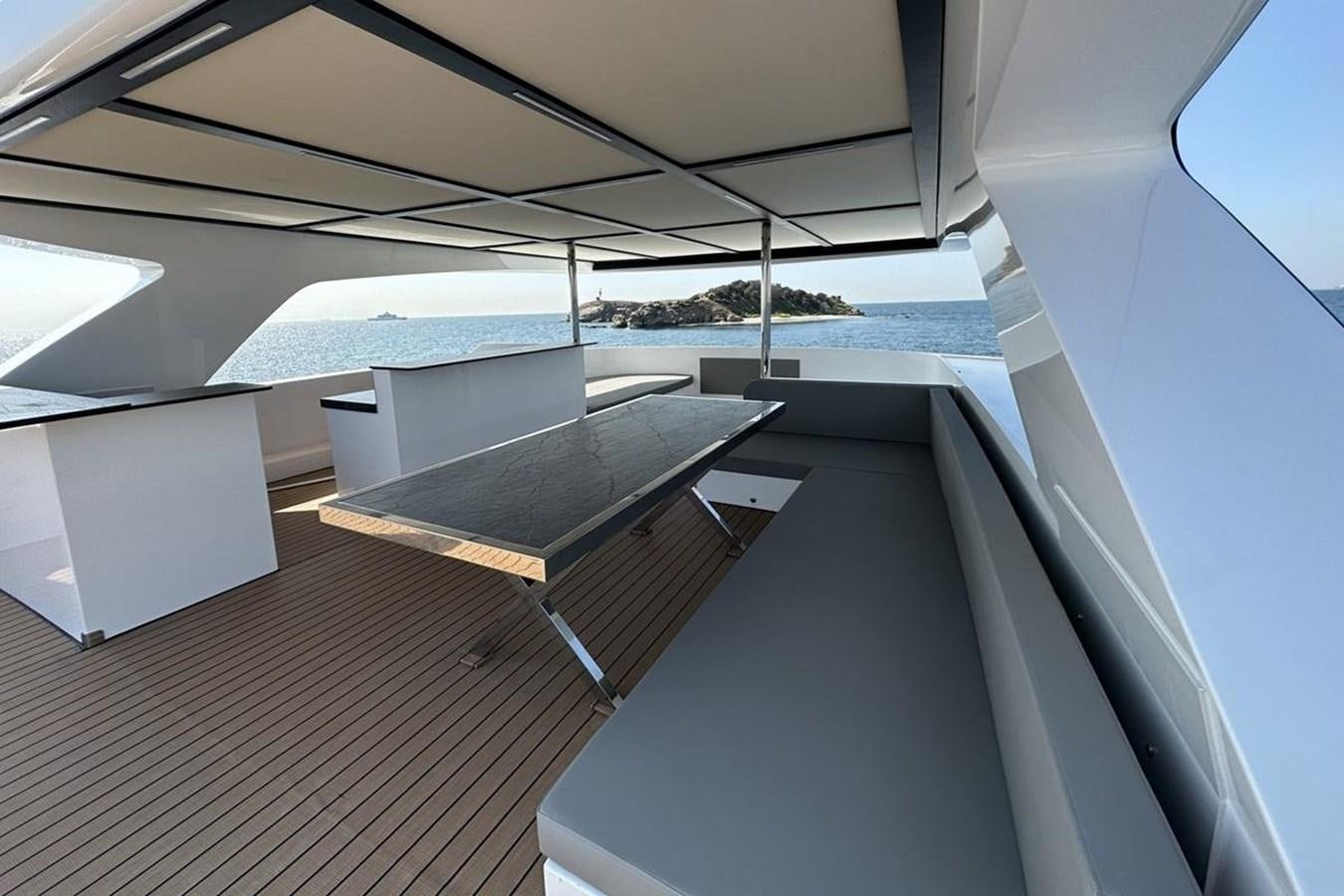 a deck with a pool and a deck aboard CARBO Yacht for Sale