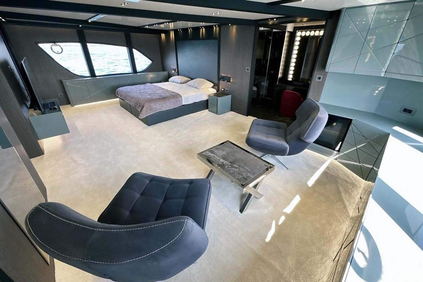a large living room with a large window aboard CARBO Yacht for Sale