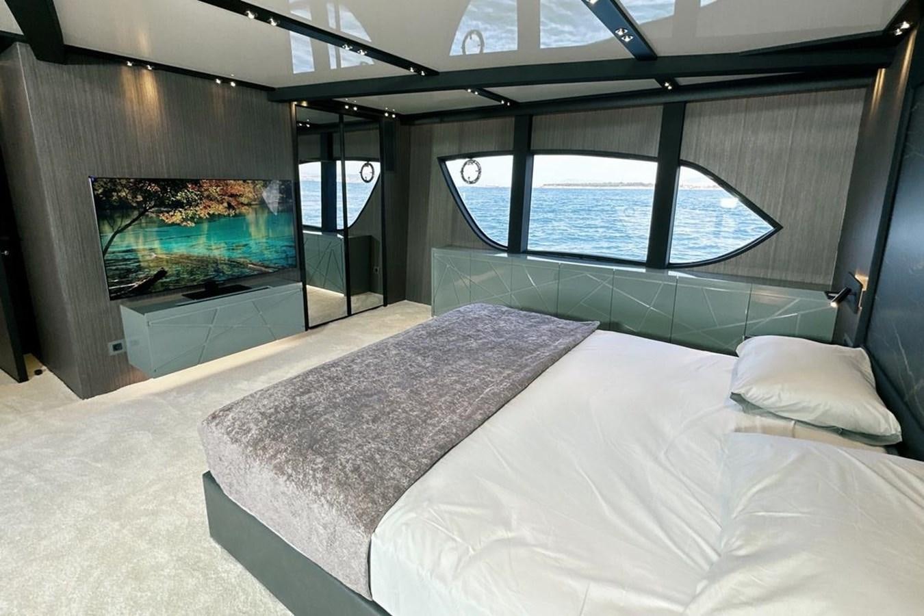 a bed in a room aboard CARBO Yacht for Sale