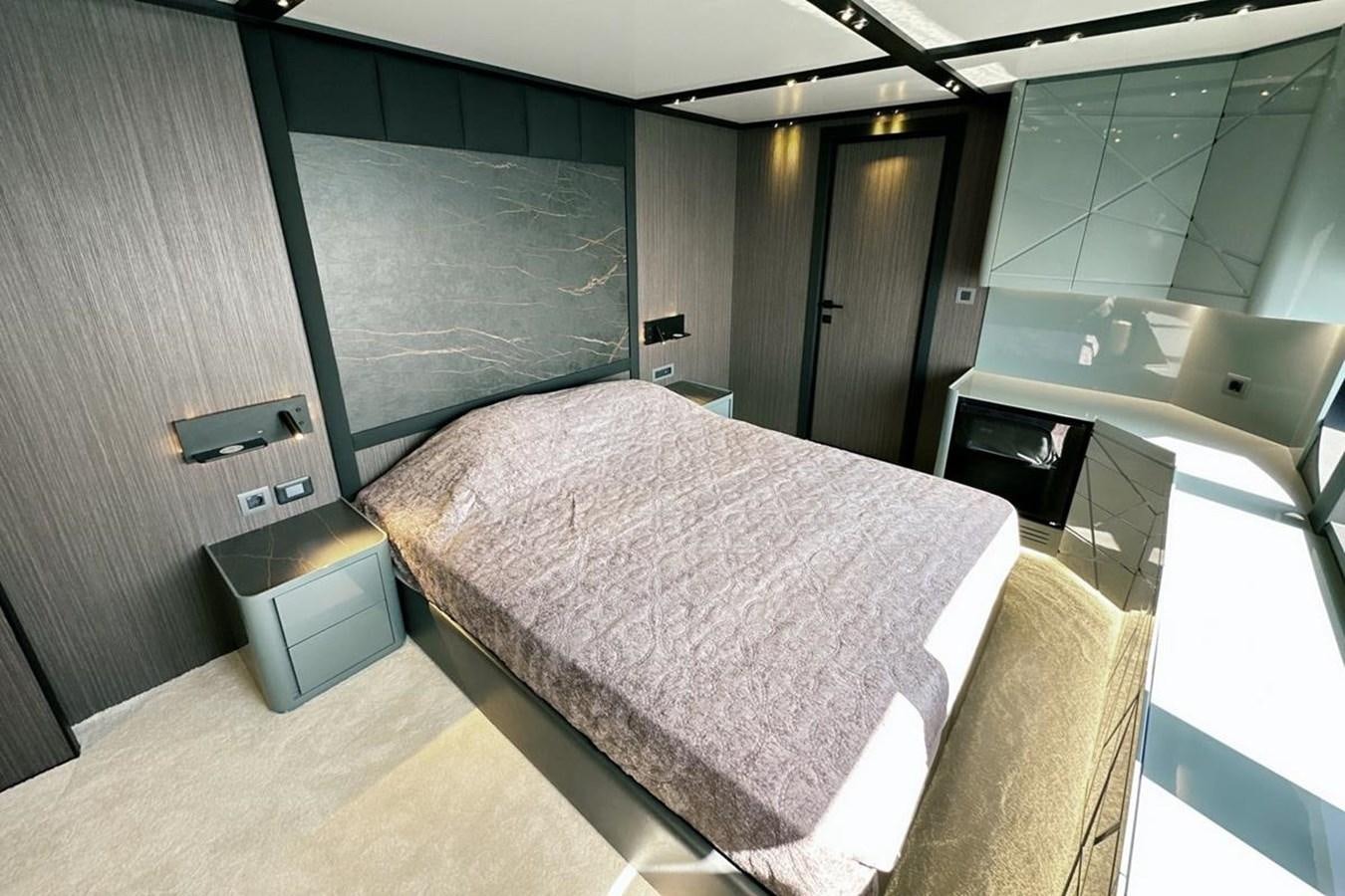 a bed in a room aboard CARBO Yacht for Sale