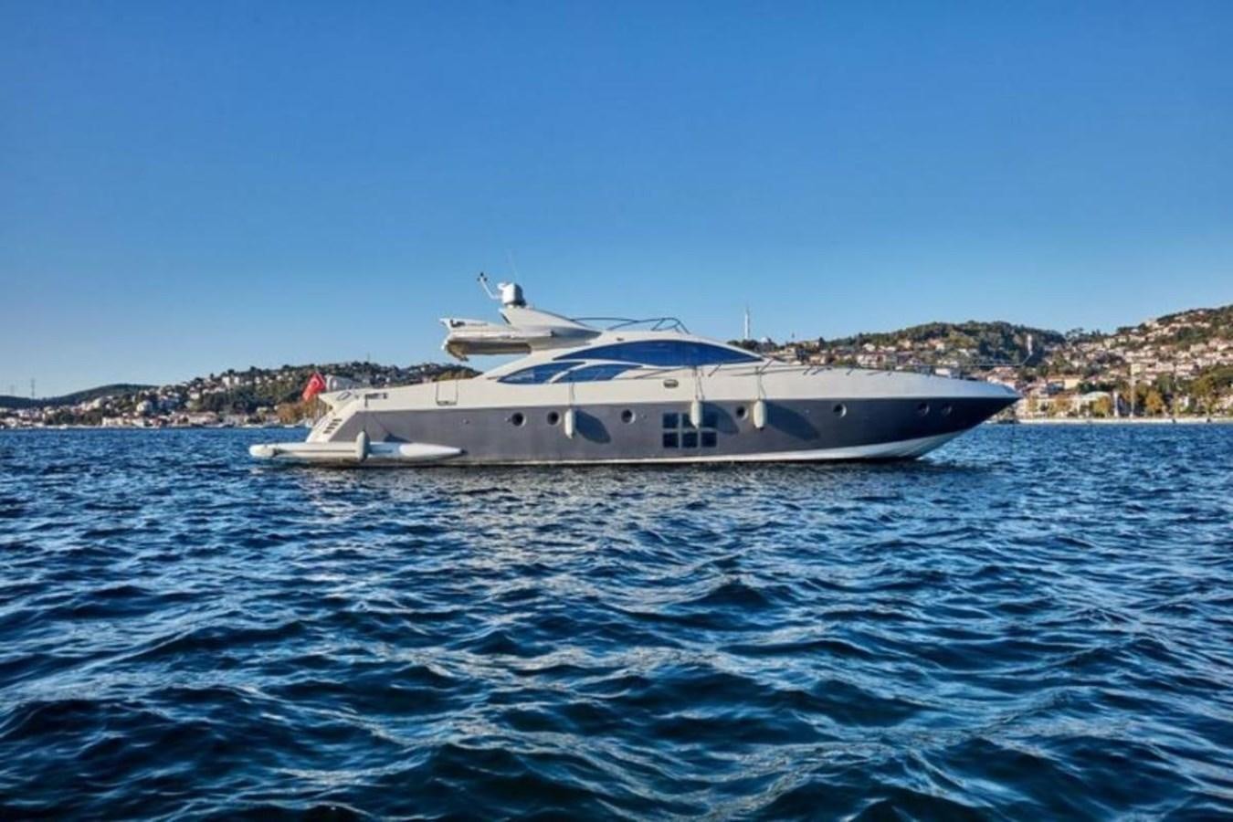 a boat in the water aboard AZIMUT 98 Yacht for Sale