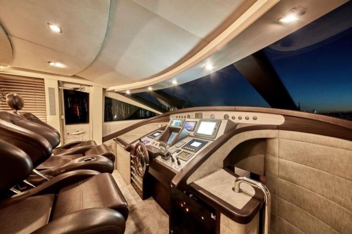 inside of a car aboard AZIMUT 98 Yacht for Sale