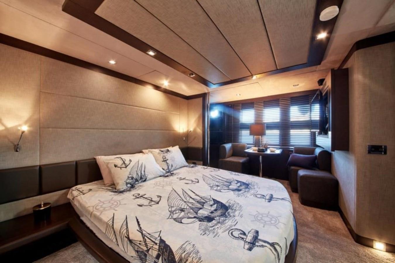 a bed in a room aboard AZIMUT 98 Yacht for Sale