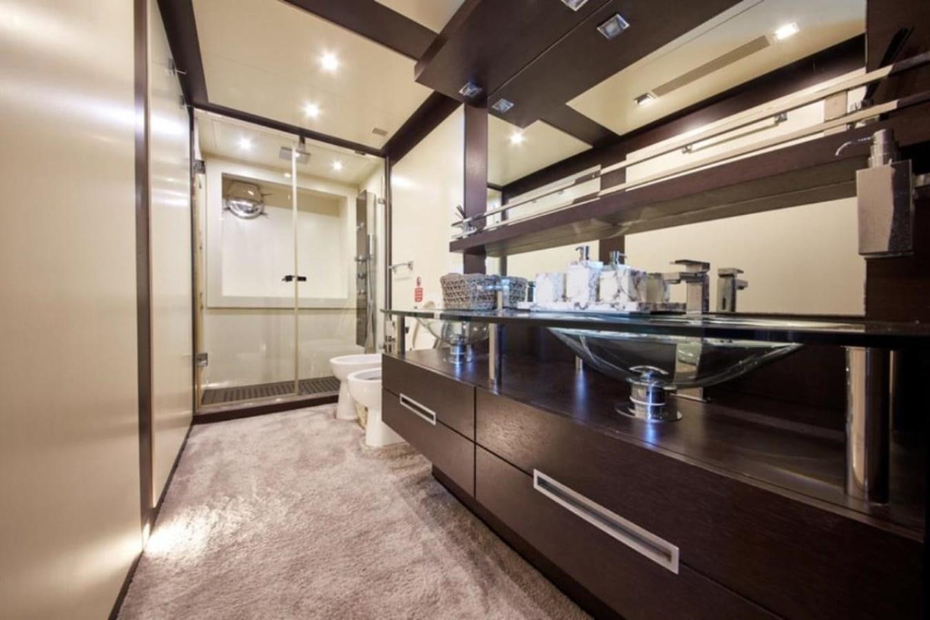 a large kitchen with a large counter aboard AZIMUT 98 Yacht for Sale