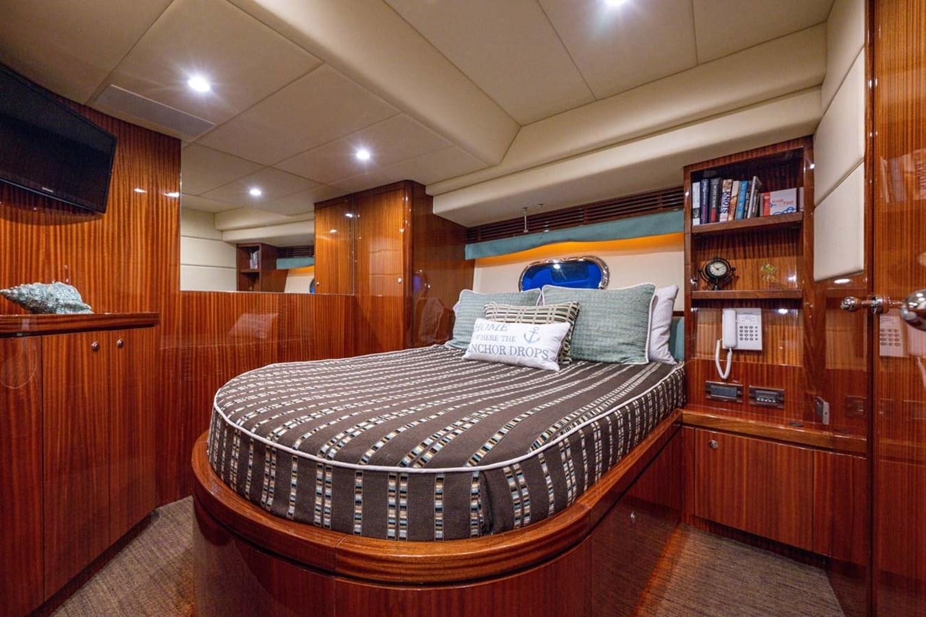 a bed in a room aboard BELLA SOGNO Yacht for Sale