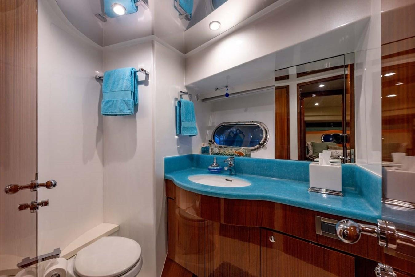 a bathroom with a sink and a mirror aboard BELLA SOGNO Yacht for Sale