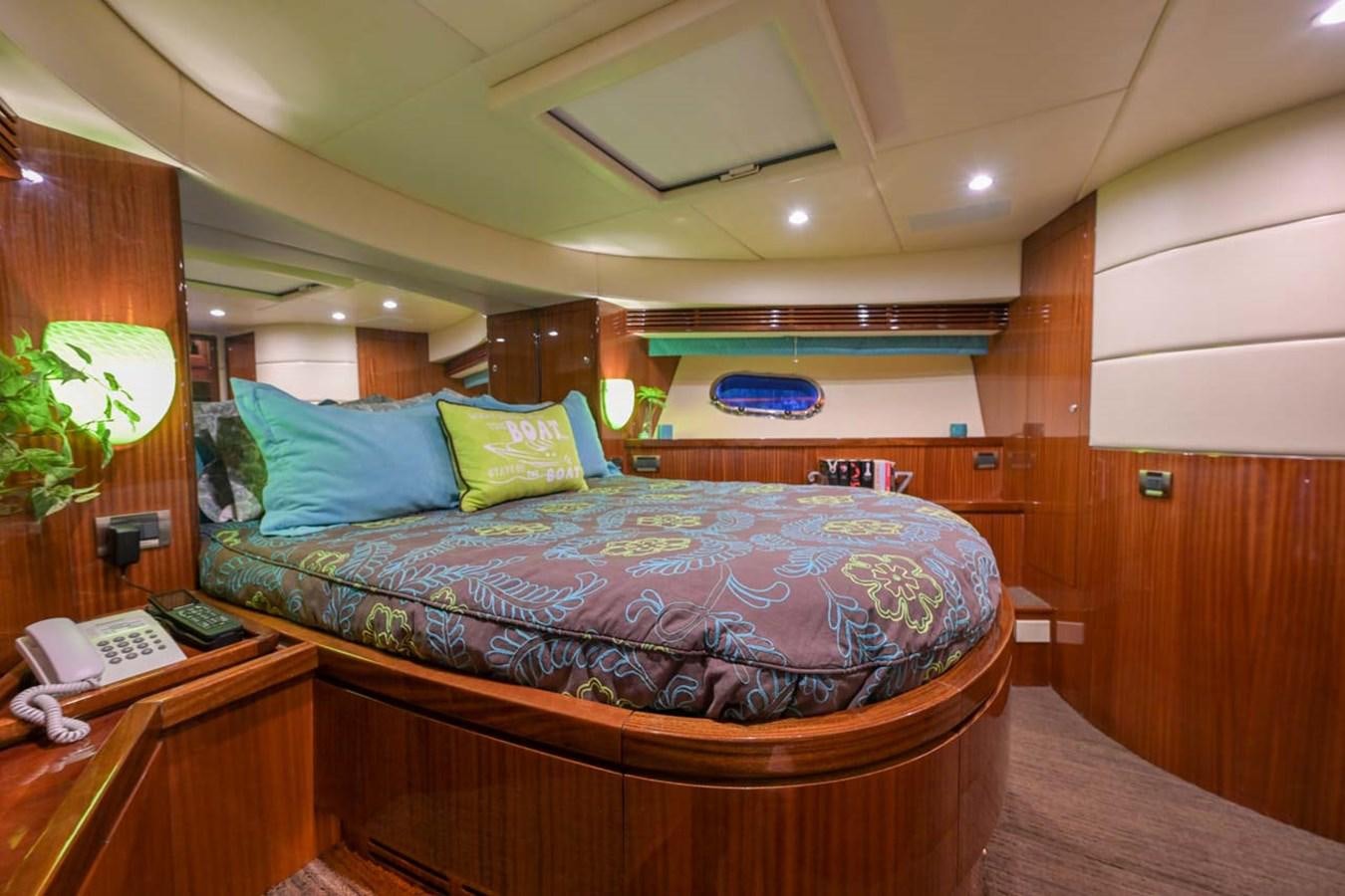 a bed in a room aboard BELLA SOGNO Yacht for Sale