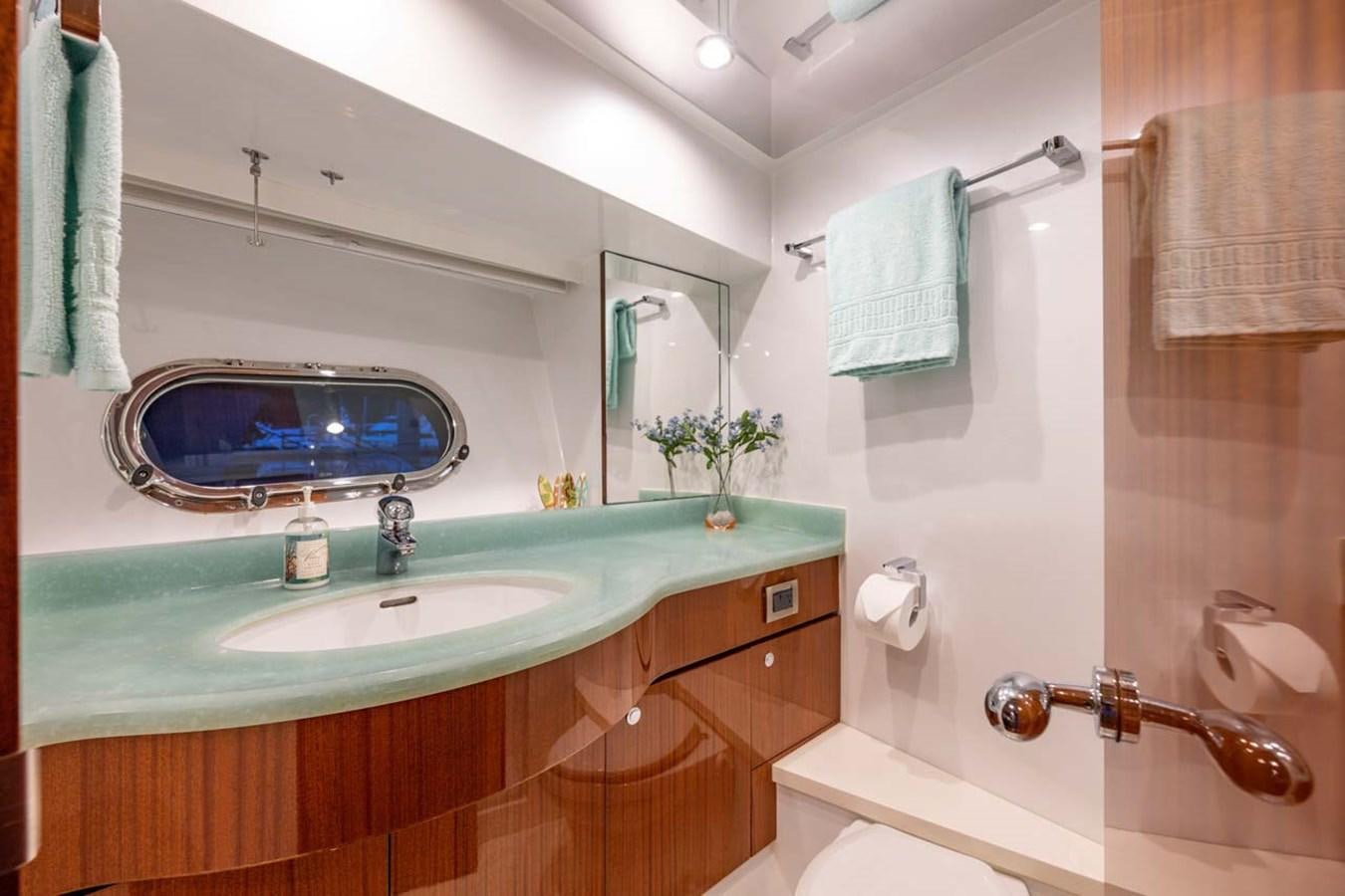 a bathroom with a large mirror aboard BELLA SOGNO Yacht for Sale