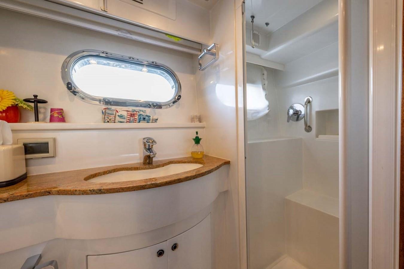 a bathroom with a large mirror aboard BELLA SOGNO Yacht for Sale
