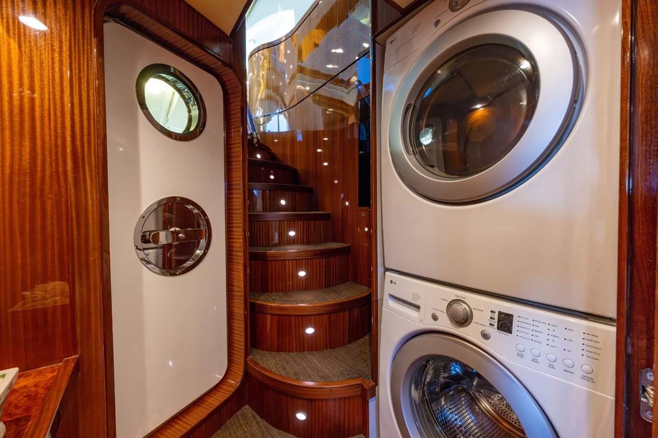 a washer and dryer in a room aboard BELLA SOGNO Yacht for Sale
