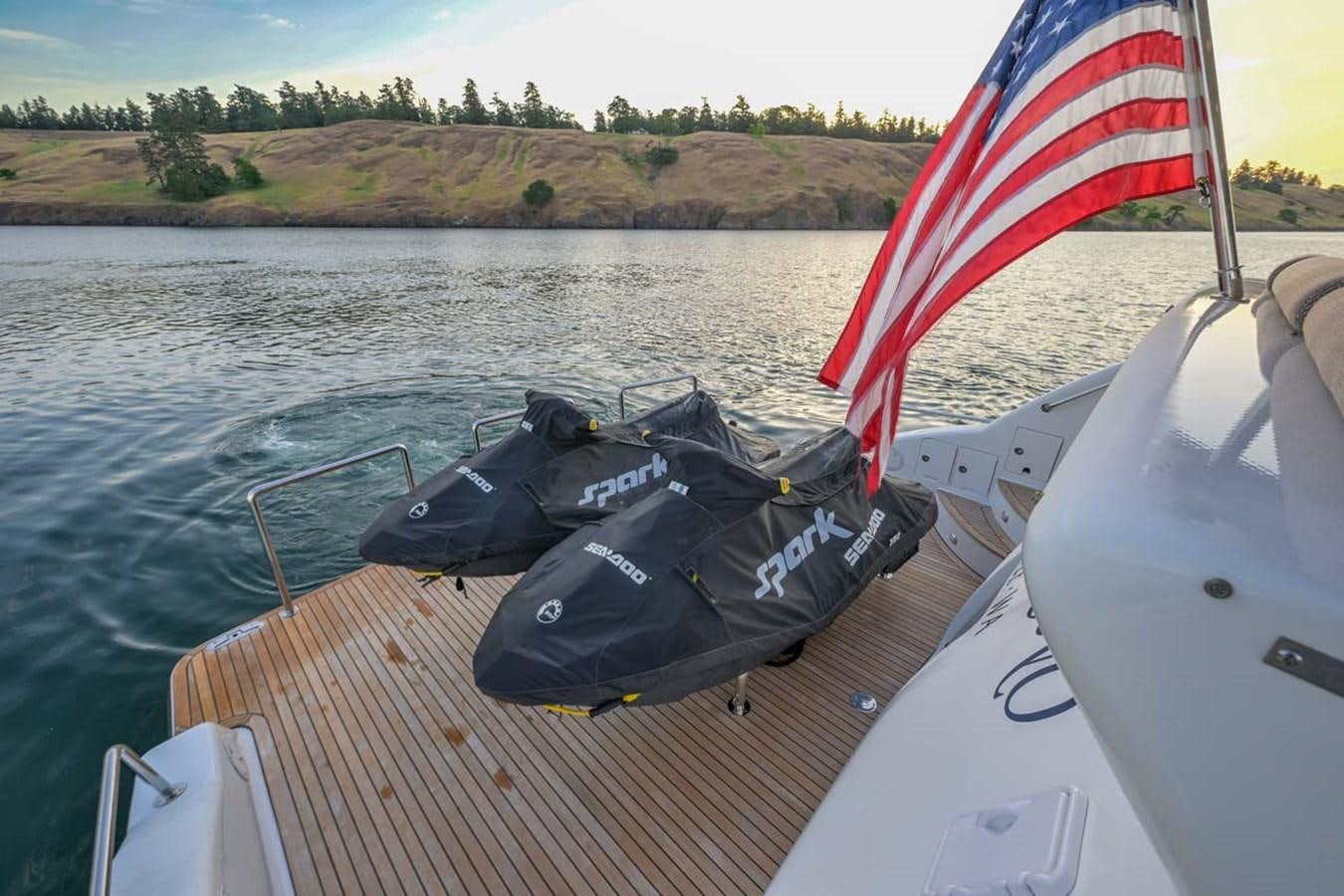 a boat with a flag on it aboard BELLA SOGNO Yacht for Sale