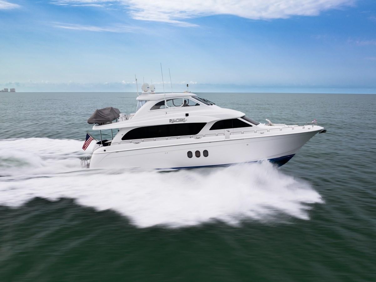 a white yacht in the water aboard RUMOURS Yacht for Sale
