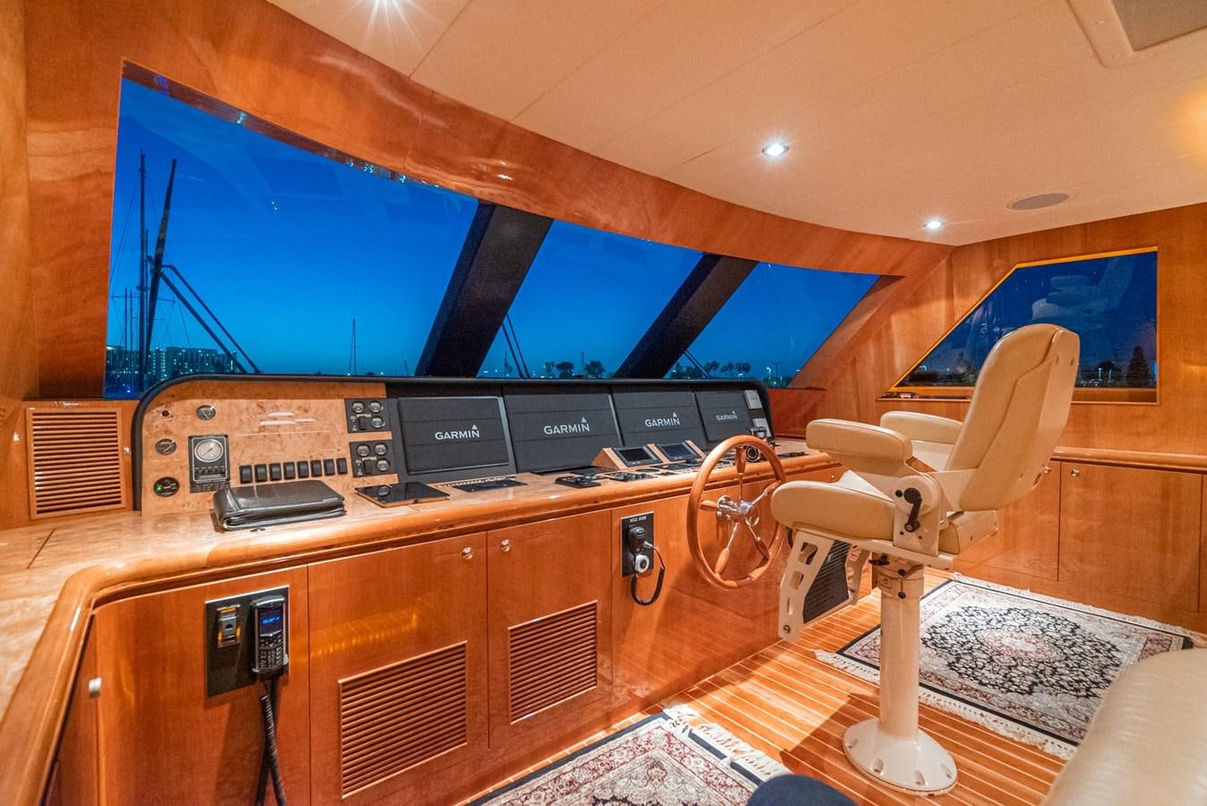 a room with a desk and chairs aboard LIBERTY Yacht for Sale