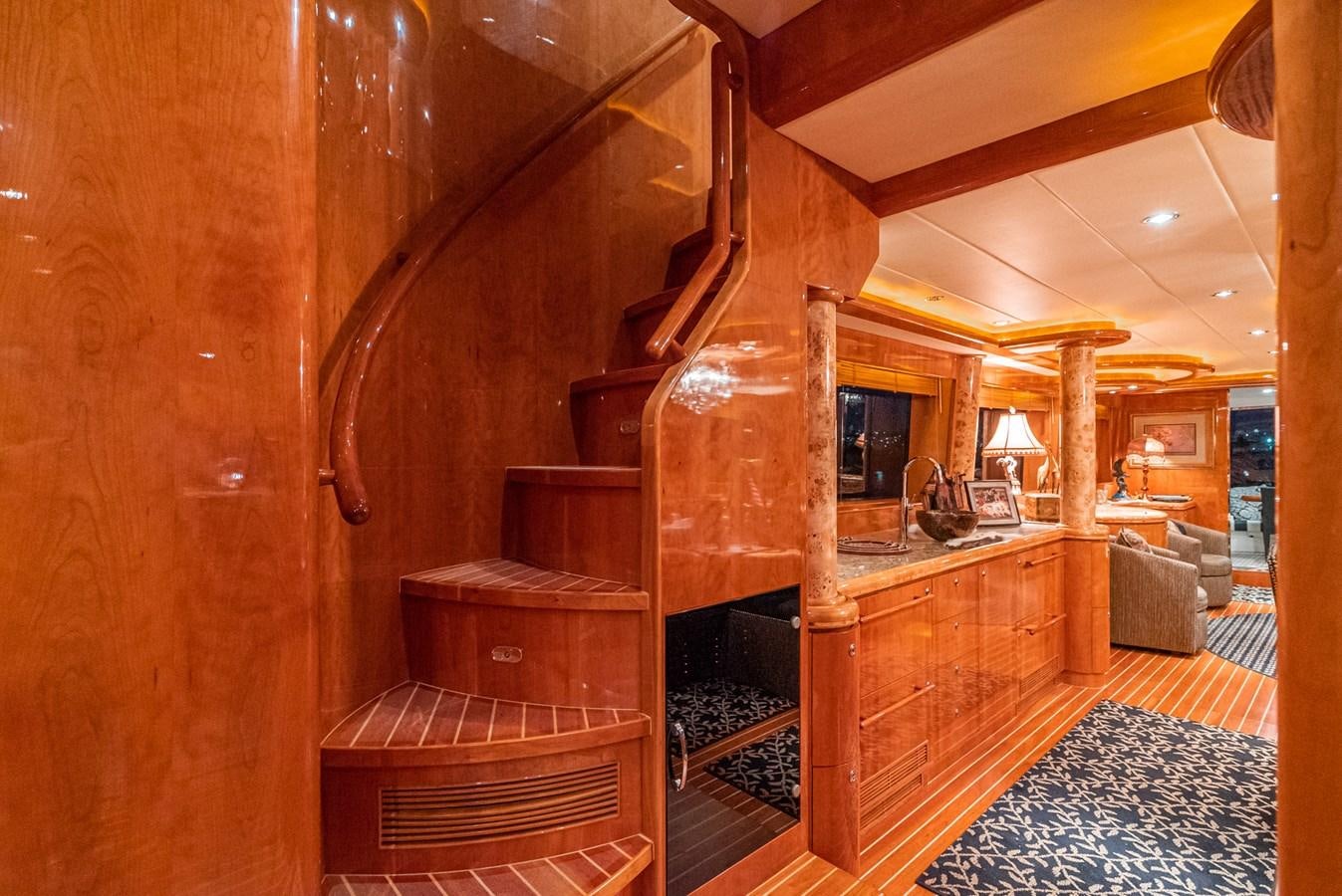a large wood room with a fireplace aboard LIBERTY Yacht for Sale