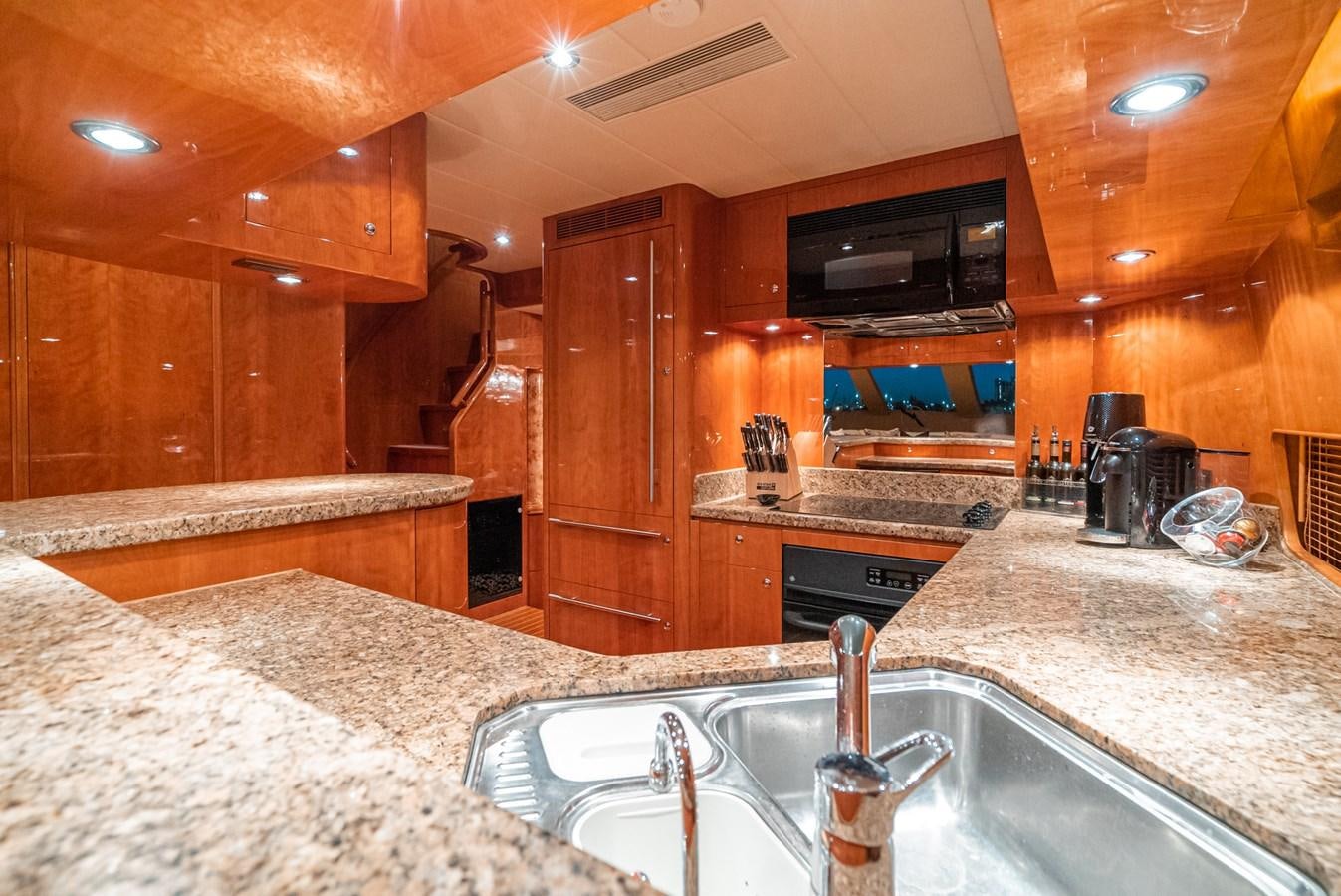 a kitchen with granite counter tops aboard LIBERTY Yacht for Sale