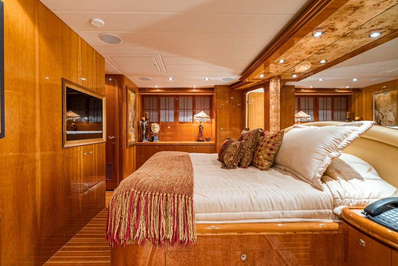 a large bed in a room aboard LIBERTY Yacht for Sale