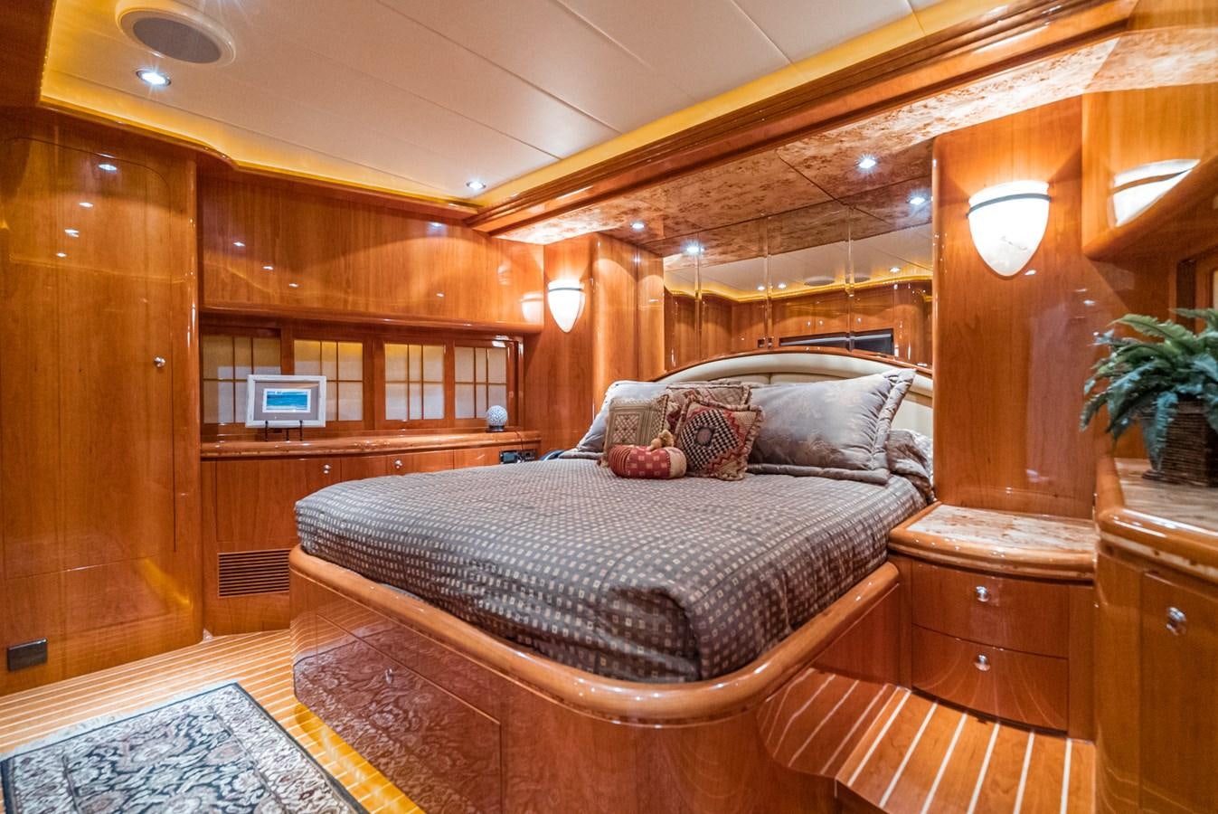 a bed in a room aboard LIBERTY Yacht for Sale