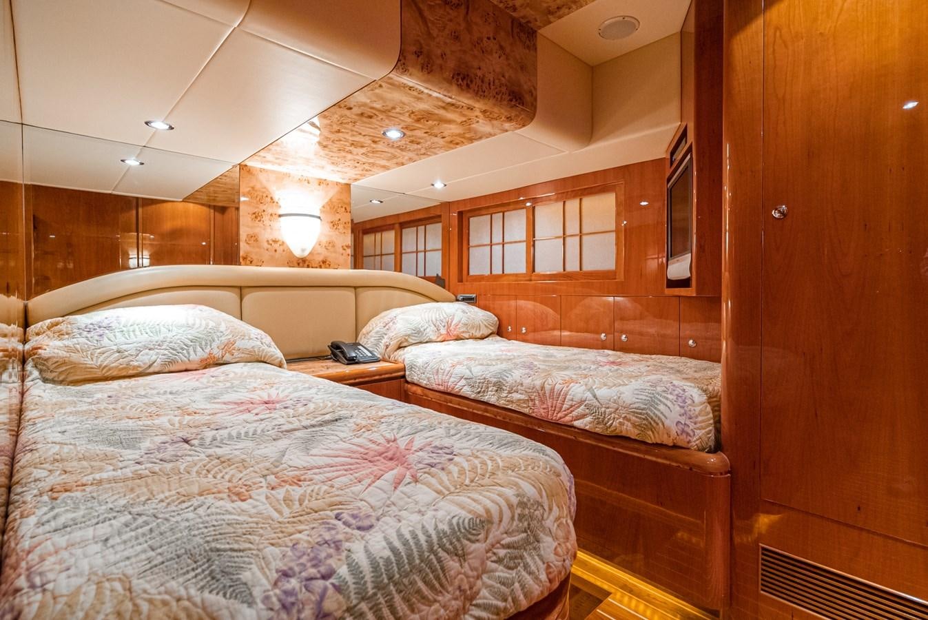 a room with two beds aboard LIBERTY Yacht for Sale
