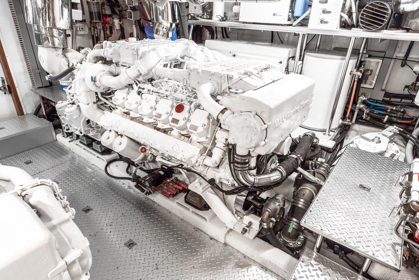 a large white machine aboard LIBERTY Yacht for Sale