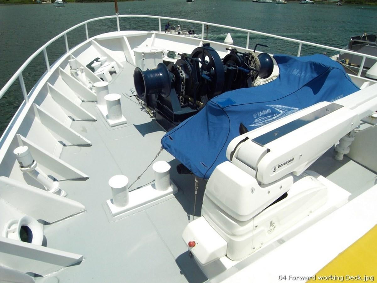 a person in a blue suit aboard WESTERN ISLES Yacht for Sale
