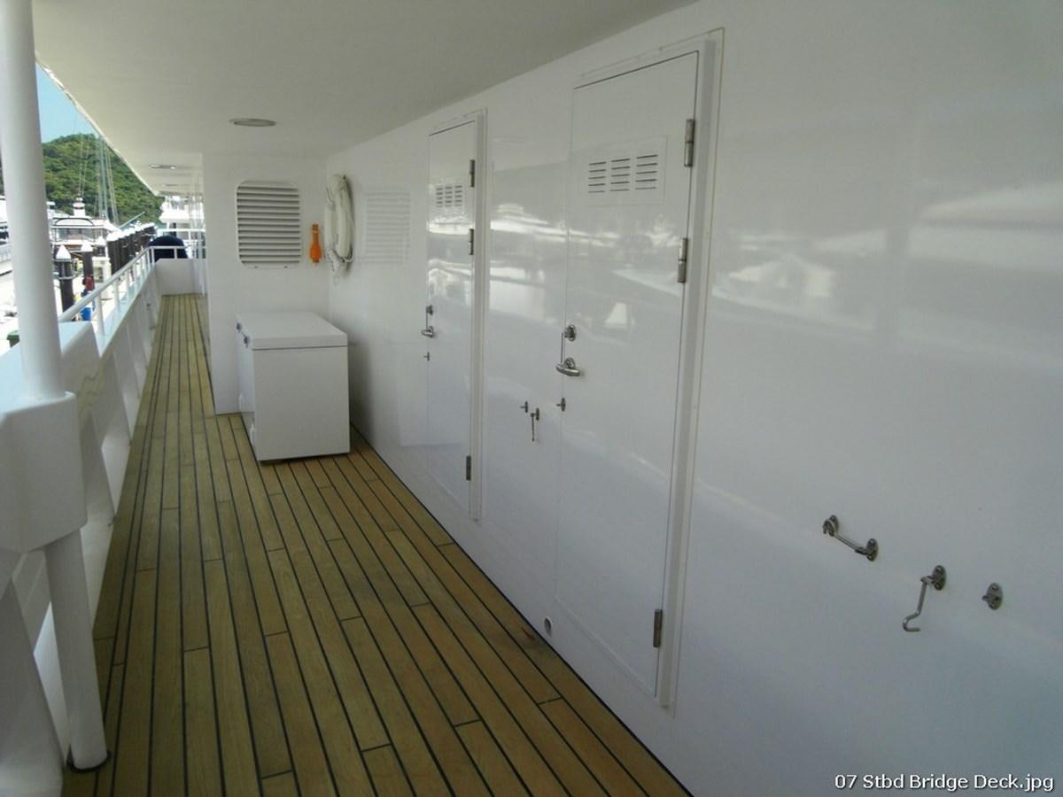 a white room with a door aboard WESTERN ISLES Yacht for Sale