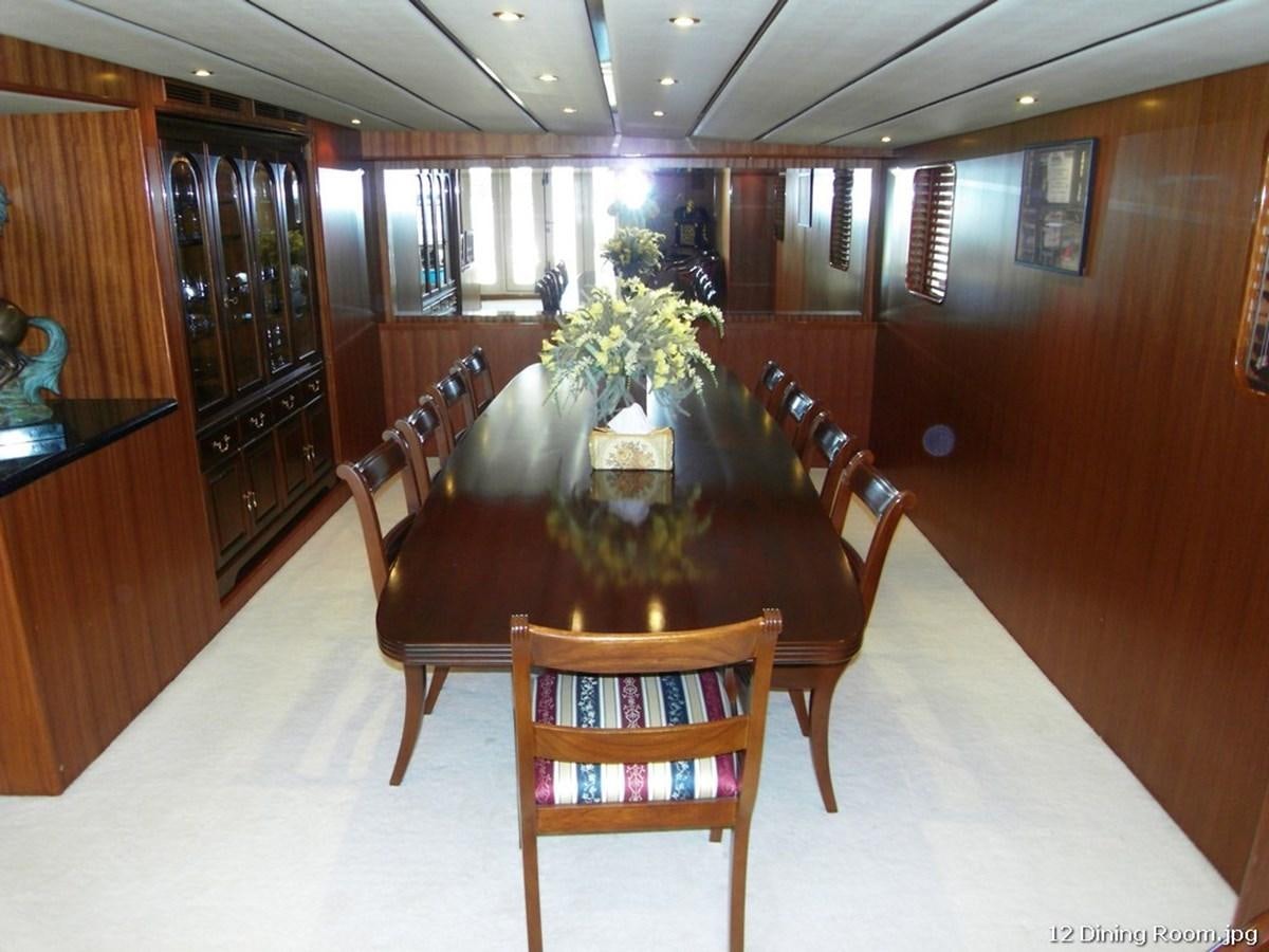a dining table in a kitchen aboard WESTERN ISLES Yacht for Sale
