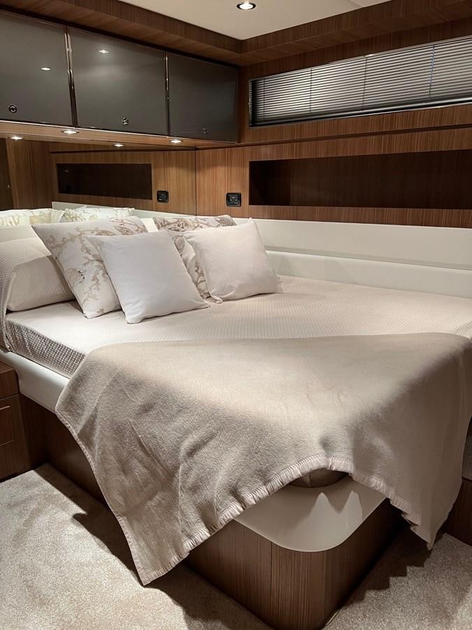 a bed with white sheets aboard ALTER EGO Yacht for Sale