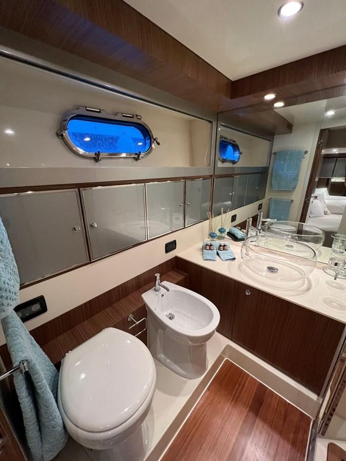 a bathroom with a large mirror aboard ALTER EGO Yacht for Sale