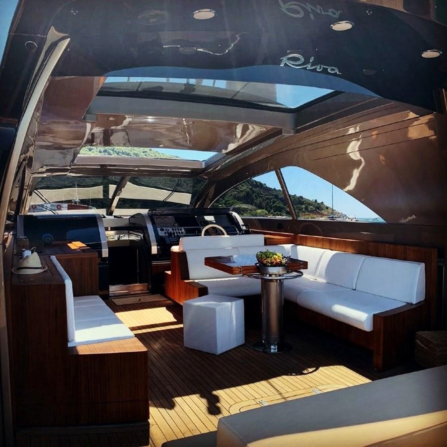 a room with a table and chairs aboard ALTER EGO Yacht for Sale