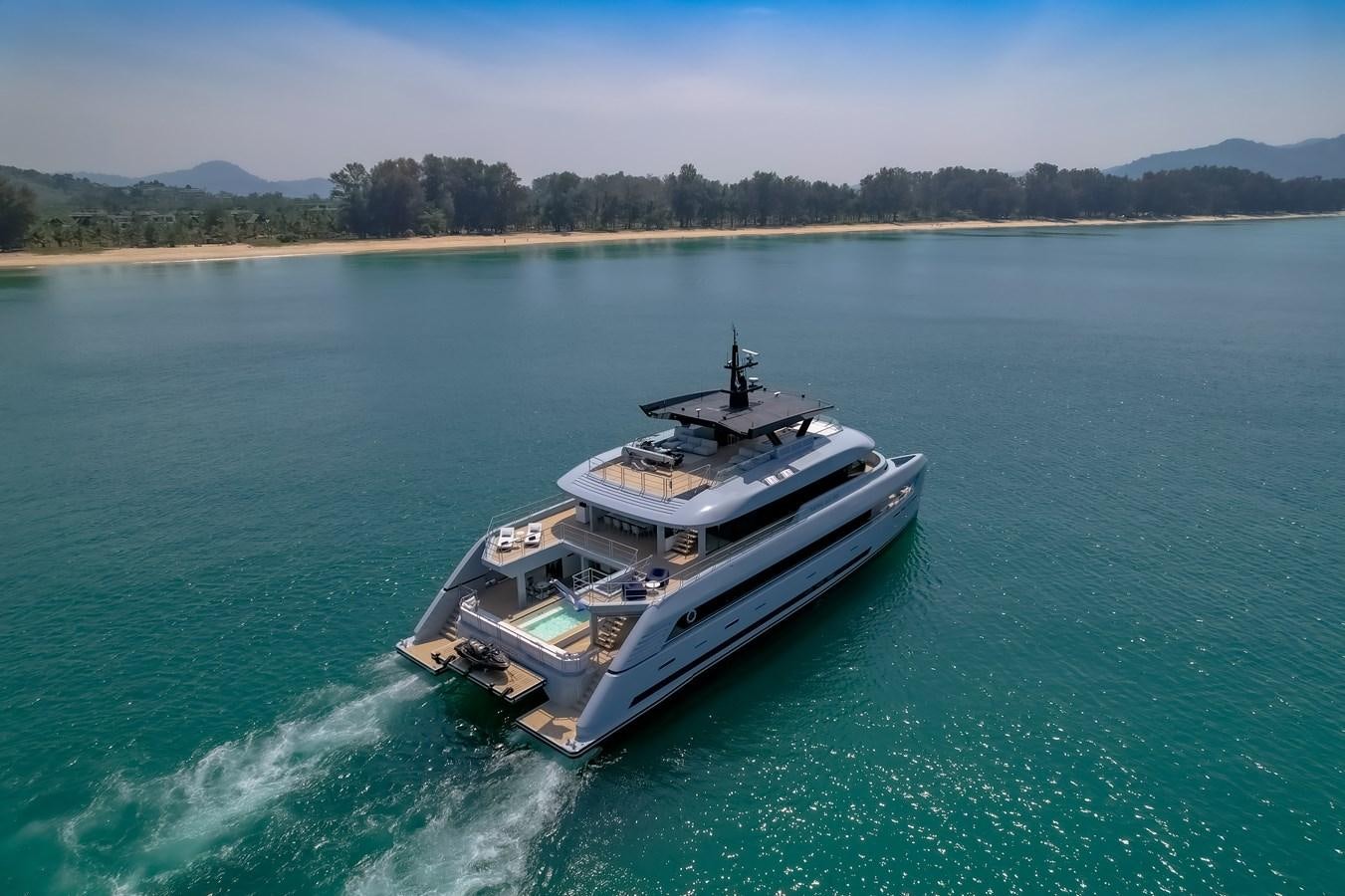 a boat on the water aboard SPACECAT Yacht for Sale