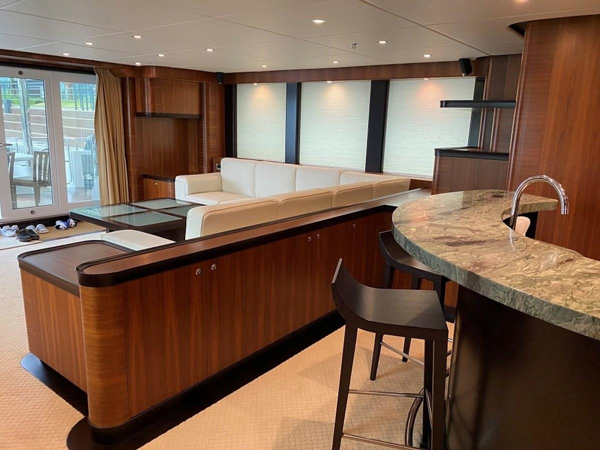 a kitchen and living room aboard RICHESSE Yacht for Sale