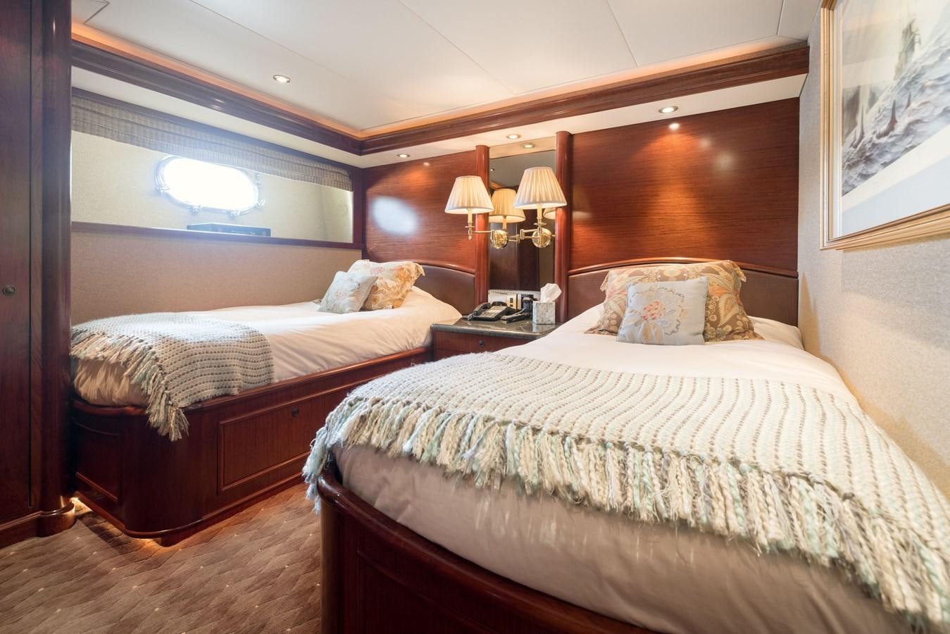a couple of beds in a room aboard REPOSADO Yacht for Sale