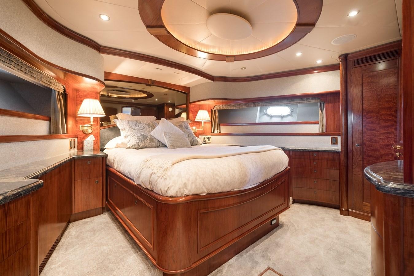 a bed in a room aboard REPOSADO Yacht for Sale