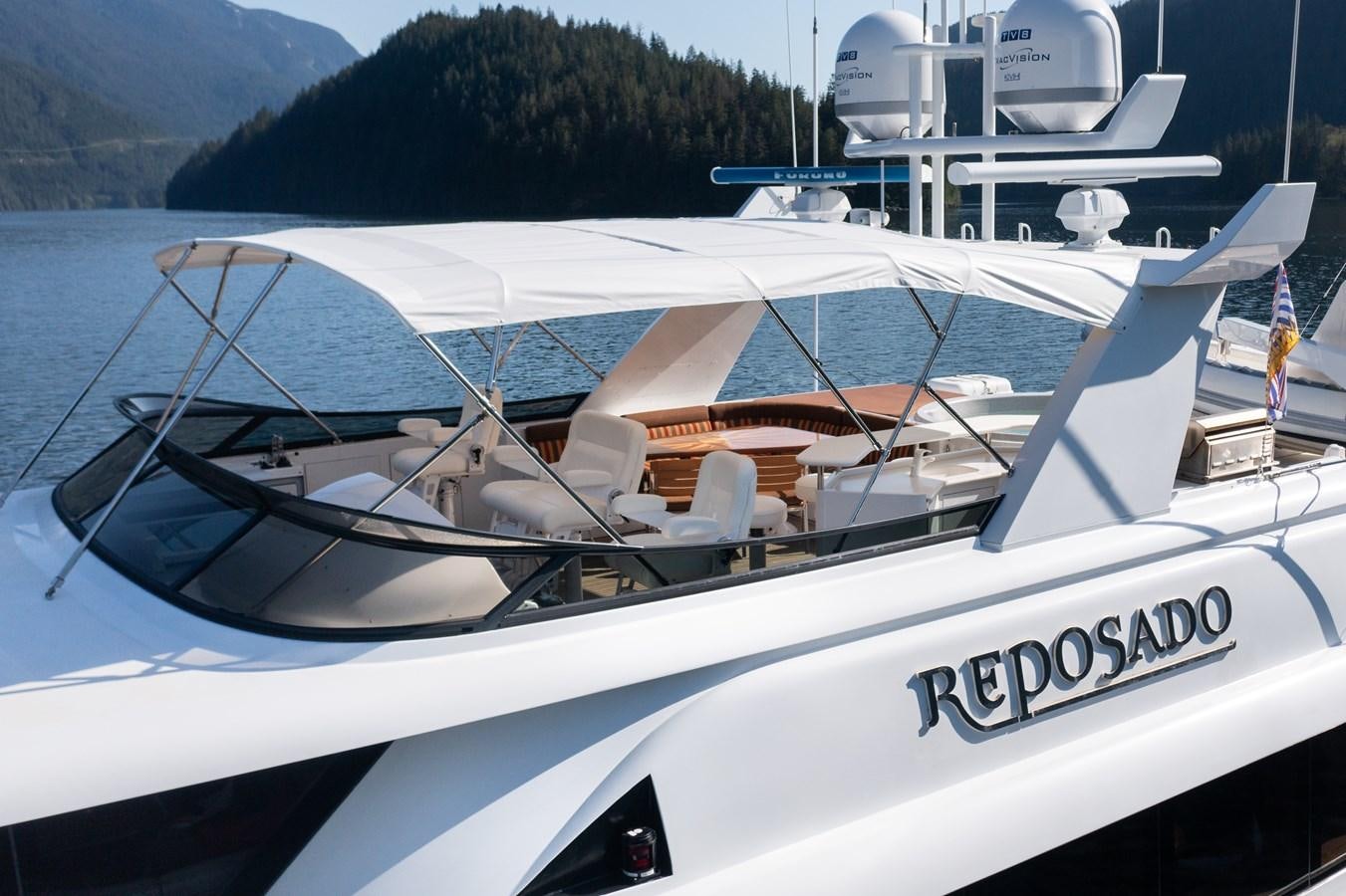 a row of white boats aboard REPOSADO Yacht for Sale