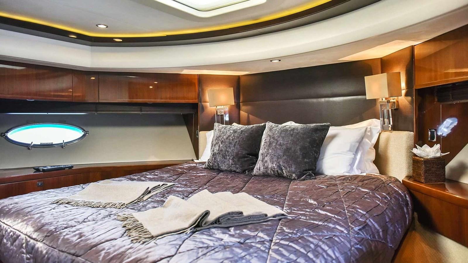 a bed with a large bed aboard AGAVE Yacht for Sale