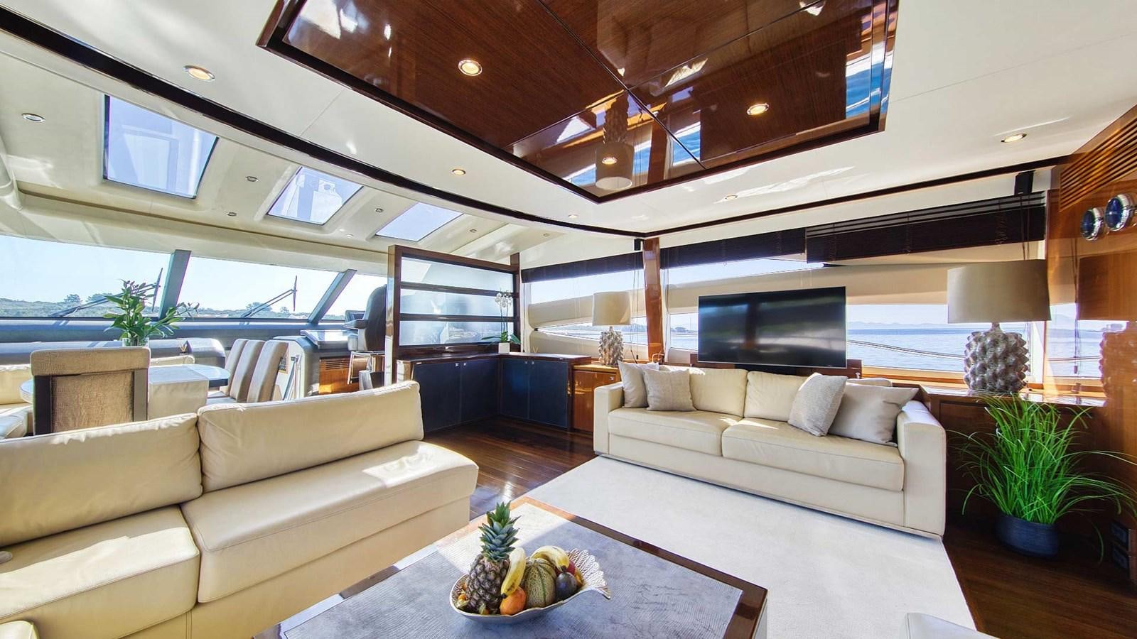 a living room with a large ceiling aboard AGAVE Yacht for Sale